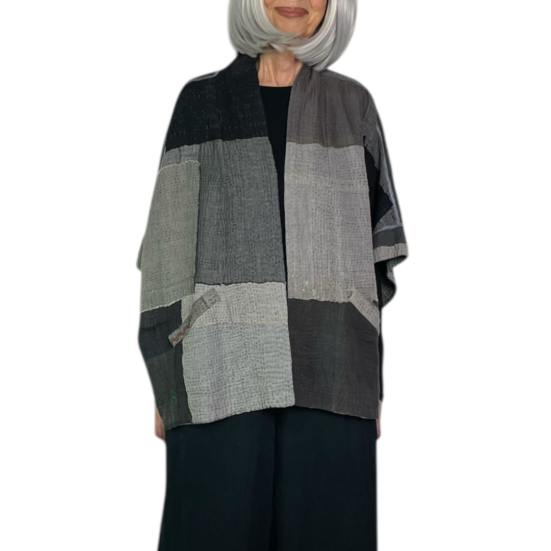 FRAYED PATCH MINI PONCHO