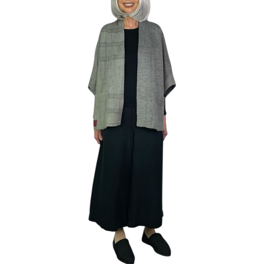 FRAYED PATCH MINI PONCHO