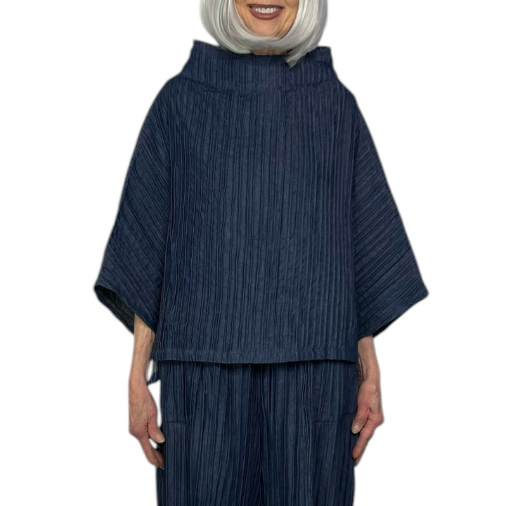 RIPPLE TUCK DENIM FUNNEL NECK TOP